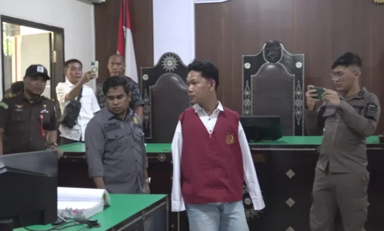 Terdakwa Agus saat menjalani sidang kedua