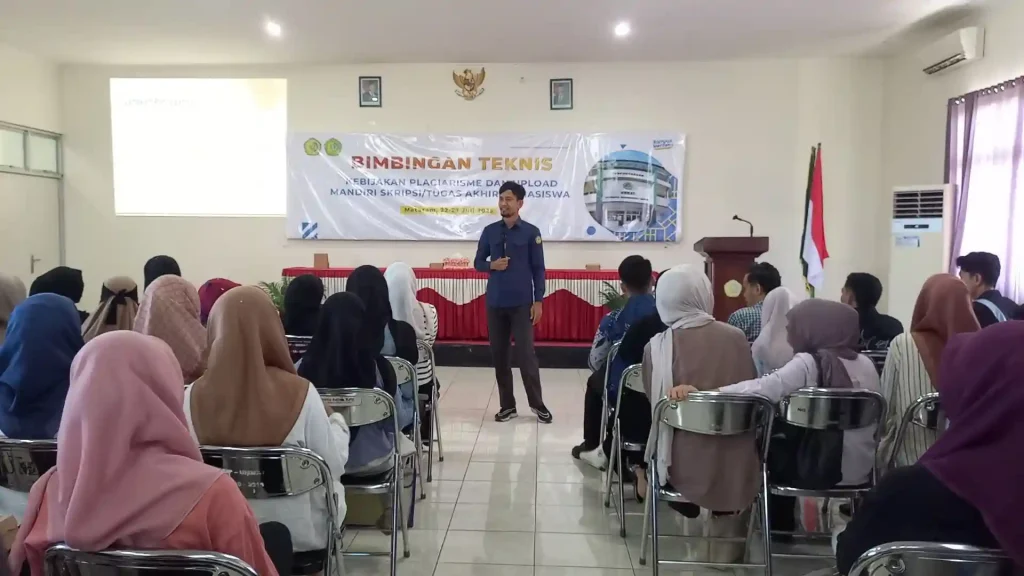 Kepala UPT Perputakaan Ummat Iskandar