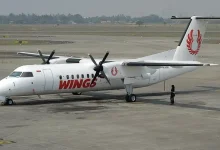 Pesawat Wings Air saat masih berada di bandara.