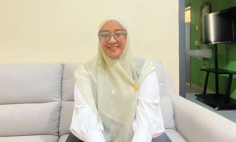 Ketua Kontingen KSB, Merliza.