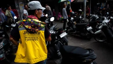Potret Jukir yang berlokasi di depan Pasar Cakranegara, Kota Mataram.